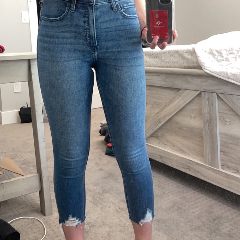 medium wash hollister jeans.